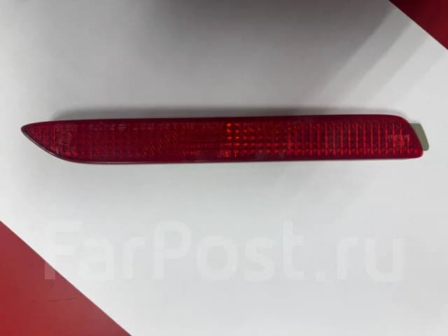 Катафот оригинал новый заднего бампера правый Toyota Camry/Harrier
